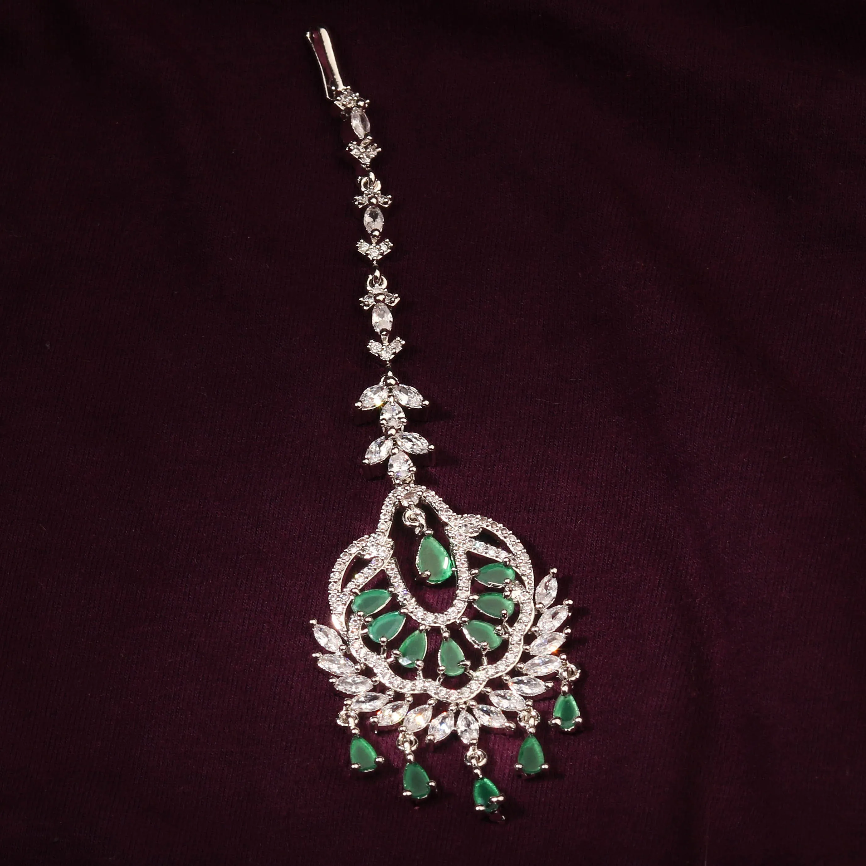 Elegant Silver Plated Maang Tikka Studded With Green Cubic Zirconia